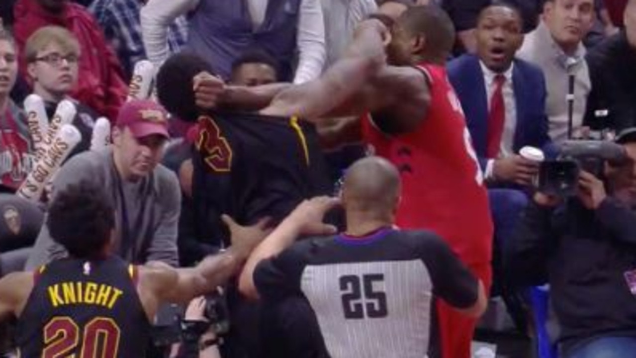 Serge Ibaka and Marquese Chriss trade punches.