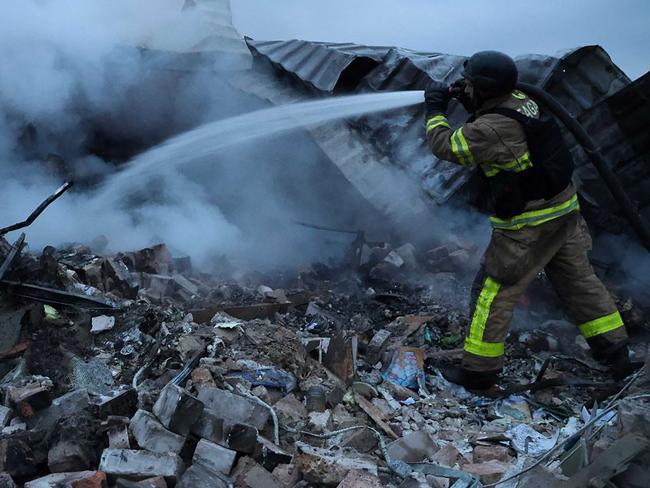 Meanwhile, fighting continues elsewhere around the nation. (Photo by Handout / Ukraine's State Emergency Service / AFP)