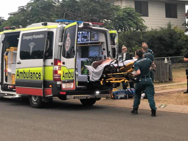 Scene of stabbing of Ray Jarvis at Thora St, Gracemere, on February 6, 2019. Pictured Mr Jarvis is being placed into the ambulance.