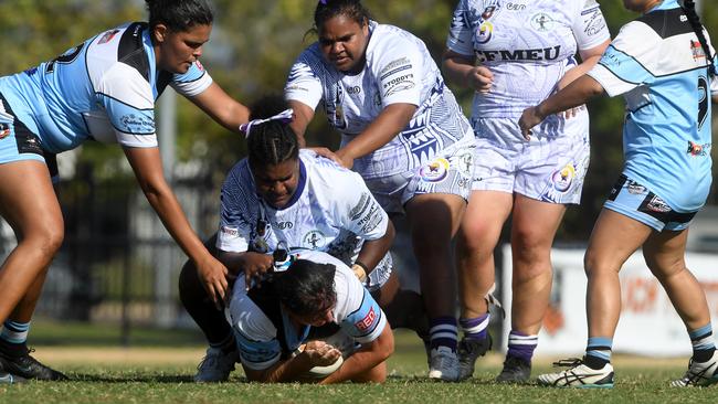 Northern Sharks' player takes on Darwin Brothers' women in the Humpty Dumpty Foundation round of 2022 NRLNT season. Picture: (A)manda Parkinson