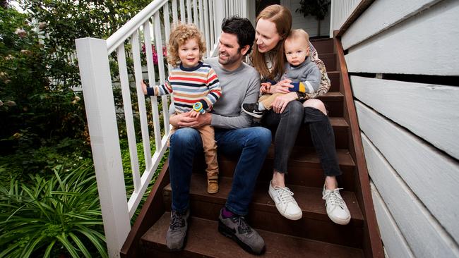 Chris and Jo Parkinson at their Melbourne home in Eltham with their children Billy, 1, and Eddie, 3. Picture: Paul Jeffers