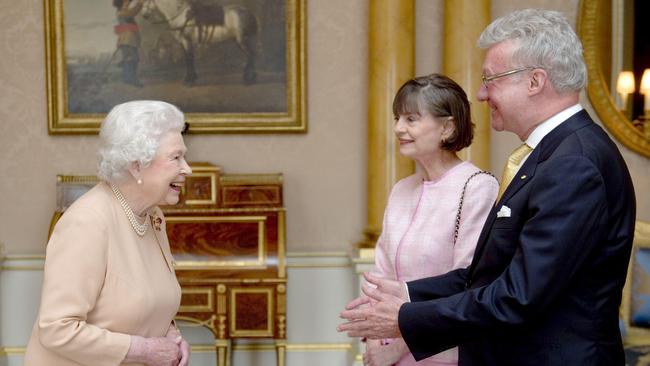 Paul de Jersey and his wife Kaye are received by Queen Elizabeth II in Buckingham Palace in October 2014 upon his appointment as Governor of Queensland. Picture: Anthony Devlin