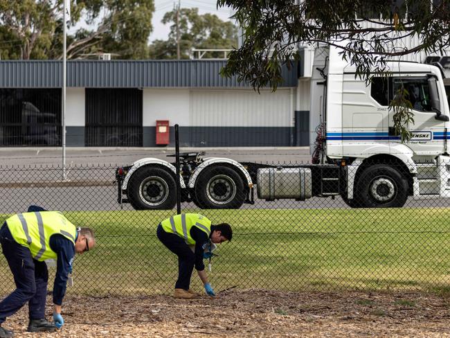 EPA officers collect samples to analyse near an area where asbestos has been found at Hosken Reserve in Altona. Picture: NCA NewsWire / Diego Fedele