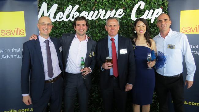 Adrian Archer (Savills), Luca Jannese (QIC), Brett Schultz (Savills), Tiffany Nguyen (NAB), John Mammoliti (Suncorp) at Savills Melbourne Cup Day celebrations at Fridays in the Brisbane CBD.