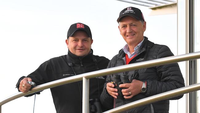 Redzel trainers Peter (right) and Paul Snowden are seen during trackwork at Royal Randwick Racecourse in Sydney, Monday, October 14, 2019. (AAP Image/Simon Bullard) NO ARCHIVING, EDITORIAL USE ONLY