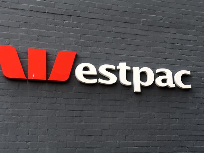 The signage of a Westpac Bank branch is seen on a wall in Sydney on Wednesday, Oct. 14, 2015. Westpac will raise its variable mortgage rates by 0.20 percentage points to 5.68 per cent on November 20, when residential investment property loan rates will go up by the same amount to 5.95 per cent. (AAP Image/Paul Miller) NO ARCHIVING