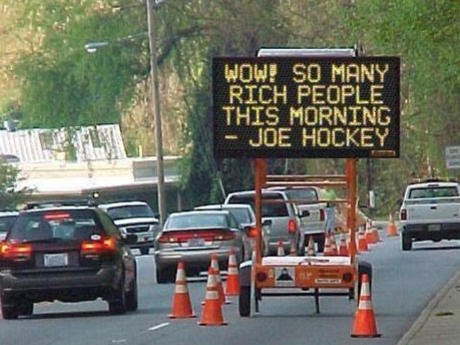 Twitter image of an LED road sign mocking Mr Hockey’s claim that poor people don’t have cars. Picture: Twitter