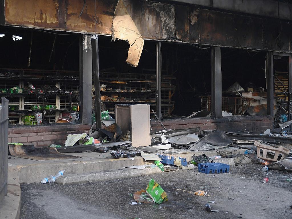 A 7 Eleven is seen damaged after being set on fire during riots and looting in St Louis, Missouri. Picture: Michael B. Thomas/Getty Images