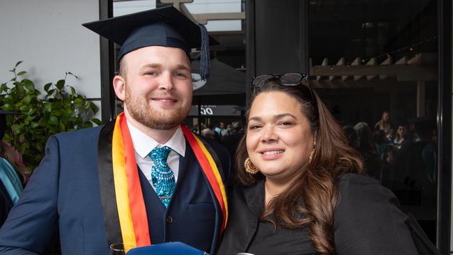 Jake Butterworth and Helena Gonebale celebrate graduation. Picture: Brad Fleet