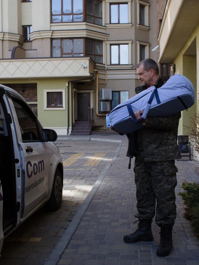 Ihor prepares to make his way to bring a surrogate-born baby boy to his parents. Picture: Getty Images