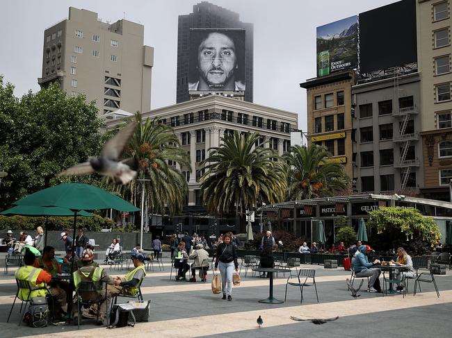 A billboard featuring former San Francisco 49ers quarterback Colin Kaepernick is displayed on the roof of the Nike Store in San Francisco.