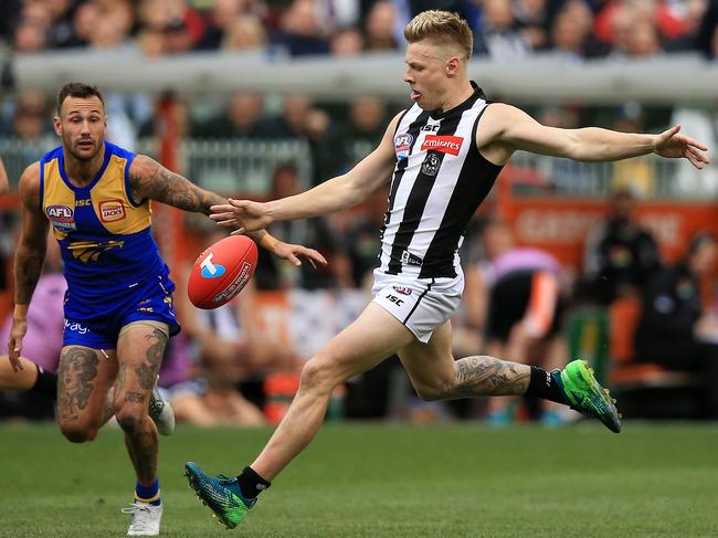 Jordan De Goey sends the Magpies into attack. Picture: Mark Stewart