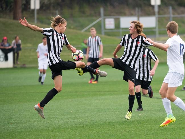 National Youth Championships for boys ,football at Coffs C.ex stadium.  14 yrs NNSW country (b&W) vs victoria country.Joel Guy(L) and Aaron Searle(R) for NNSW..03 October 2016.