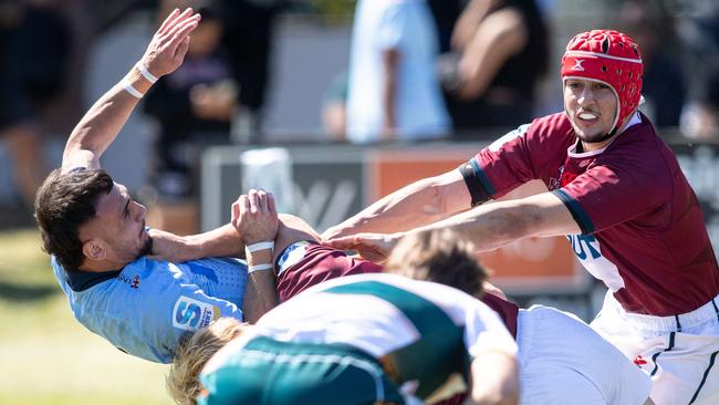 NSW player Omar Noureddine is bundled into touch in the Super Rugby U19s series. Picture: Julian Andrews