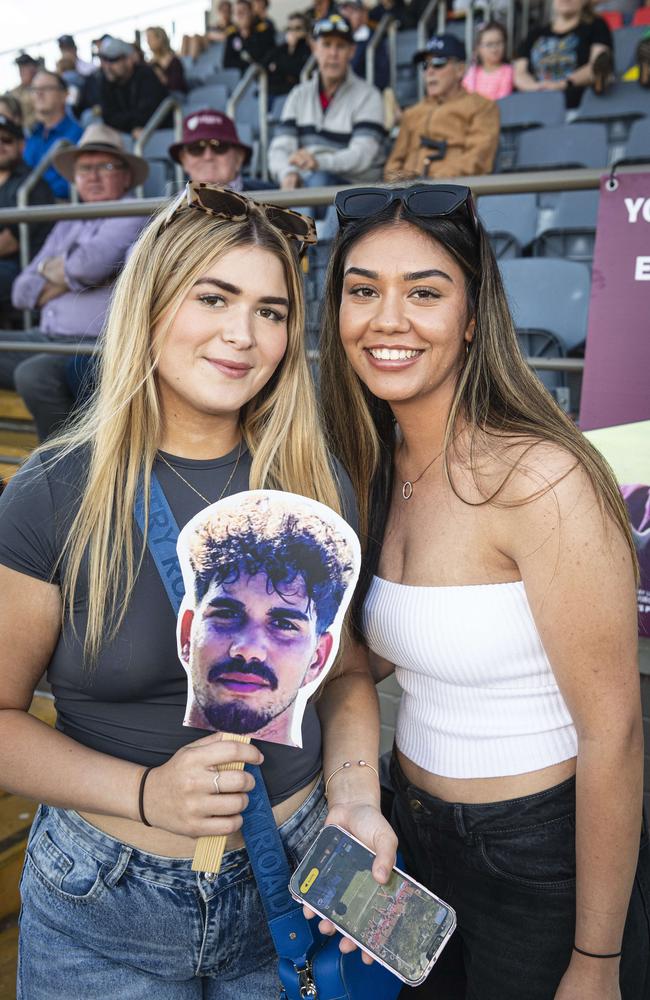 Piper McDonald (left) and Meelah McCarthy show their support for U19 Dalby player Lleyton Dodd on TRL grand final day at Toowoomba Sports Ground, Saturday, September 14, 2024. Picture: Kevin Farmer