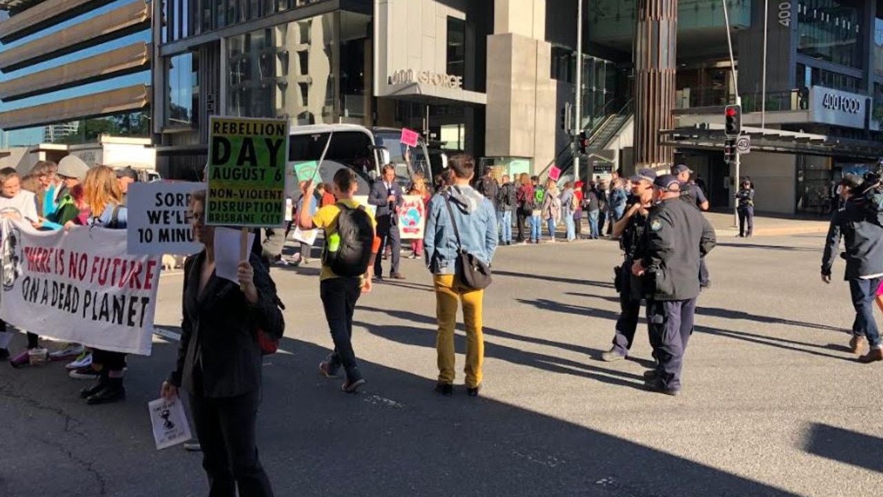 Protesters block Brisbane CBD intersections to protest climate change ...