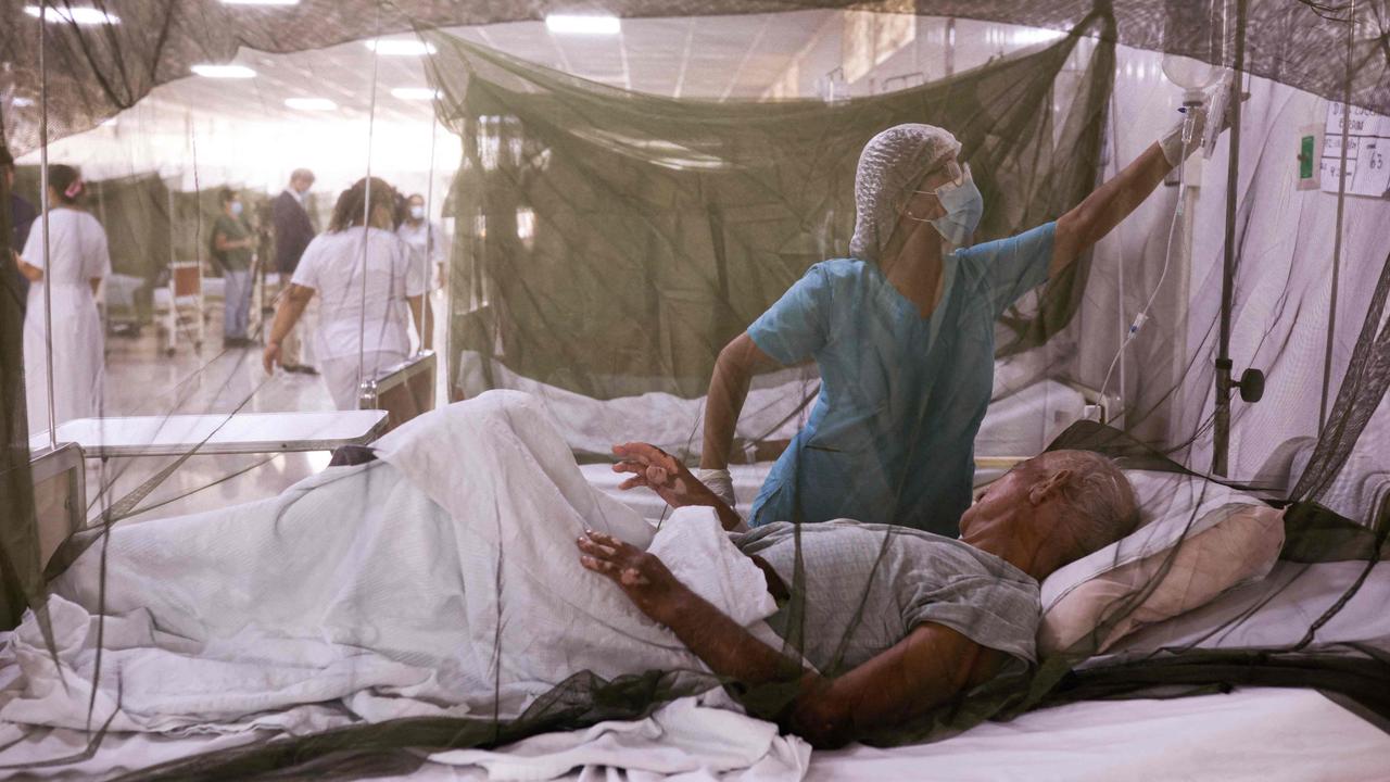 A nurse taking care of a dengue fever patient at a hospital in Lima, Peru earlier this year. The disease in common in many tropical countries including in the Americas, Africa, the Middle East, Asia and the Pacific Islands. Picture: Juan Carlos Cisneros / AFP