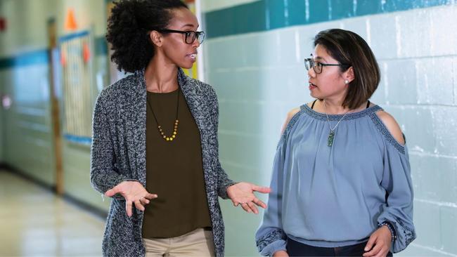 Teacher talking to mum. Image: iStock