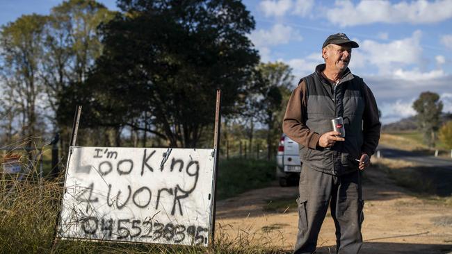 Unemployed Pete Camac gets his message across at his home in Adelong, in the electorate of Eden-Monaro, on Tuesday. Picture: Sean Davey