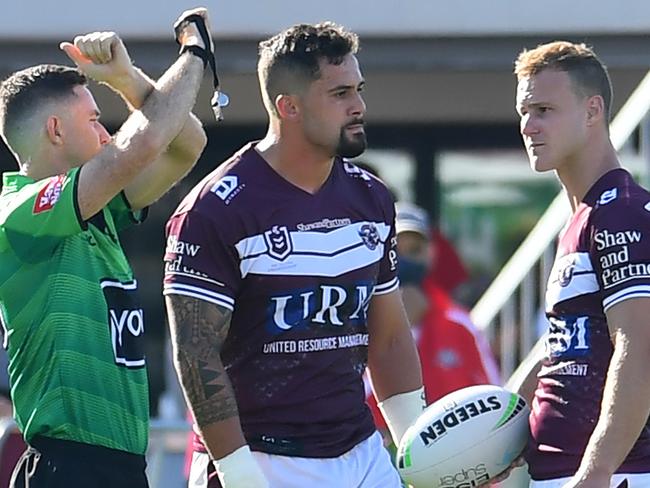 BRISBANE, AUSTRALIA - AUGUST 29:  Referee Chris Sutton places Josh Aloiai (2nd L) of the Sea Eagles on report during the round 24 NRL match between the Manly Sea Eagles and the Canterbury Bulldogs at Moreton Daily Stadium on August 29, 2021, in Brisbane, Australia. (Photo by Albert Perez/Getty Images)