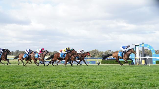 Horses race at Sandown Hillside Racecourse. Picture: Getty Images