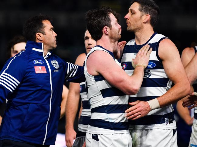 ADELAIDE, AUSTRALIA - JUNE 22: (L-R) Cats head coach Chris Scott, Patrick Dangerfield of the Cats and Harry Taylor of the Cats are pictured during the round 14 AFL match between the Port Adelaide Power and the Geelong Cats at Adelaide Oval on June 22, 2019 in Adelaide, Australia. (Photo by Daniel Kalisz/Getty Images)