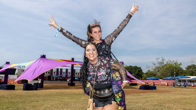 Savanna Cooper - Mesh black top with cats snakes & bright coloured mushroom butterfly long pants and Taleesha Spencer - mushroom mesh top with black boob tube & black leather skort & vans at the Bass in the Grass 2025. Picture: Pema Tamang Pakhrin