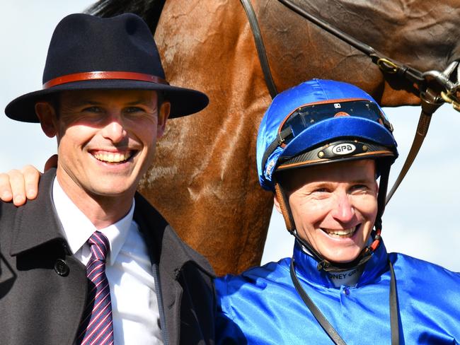 MELBOURNE, AUSTRALIA - OCTOBER 08: James McDonald poses with Trainer James Cummings and connections after riding Golden Mile to win Race 8, the Neds Caulfield Guineas,  during Caulfield Guineas Day at Caulfield Racecourse on October 08, 2022 in Melbourne, Australia. (Photo by Vince Caligiuri/Getty Images)