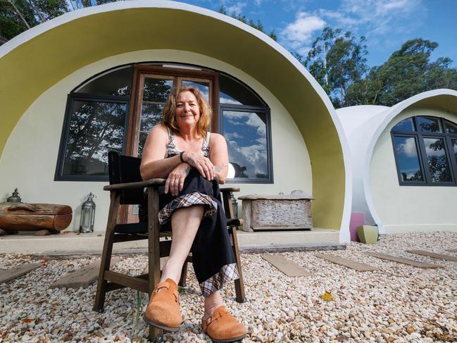 Cath Wild outside her dome home she designed and built at Flaxton in the Sunshine Coast hinterland. Picture Lachie Millard