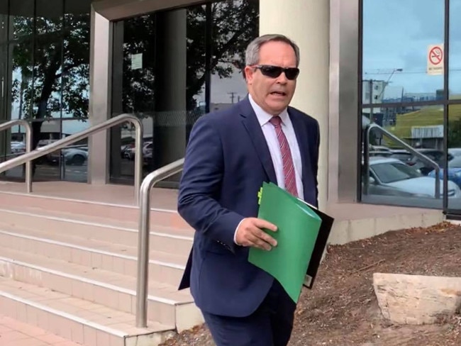 Lawyer Brad Hill leaves court, offering no comment about his client Brad Murray Evans.