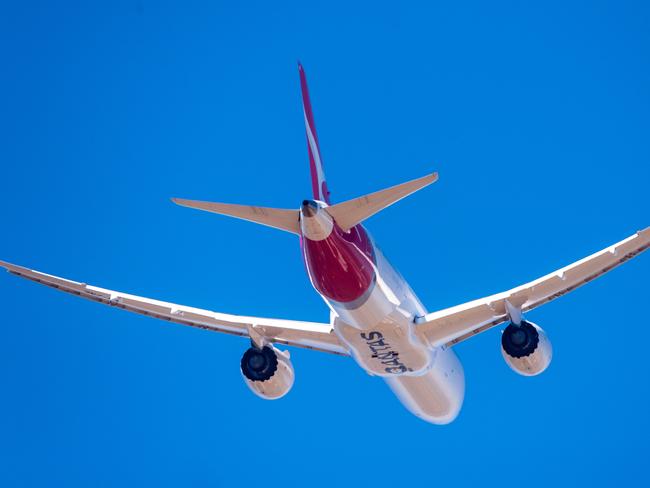 A Qantas flight from Darwin departs for Delhi. Picture: Che Chorley