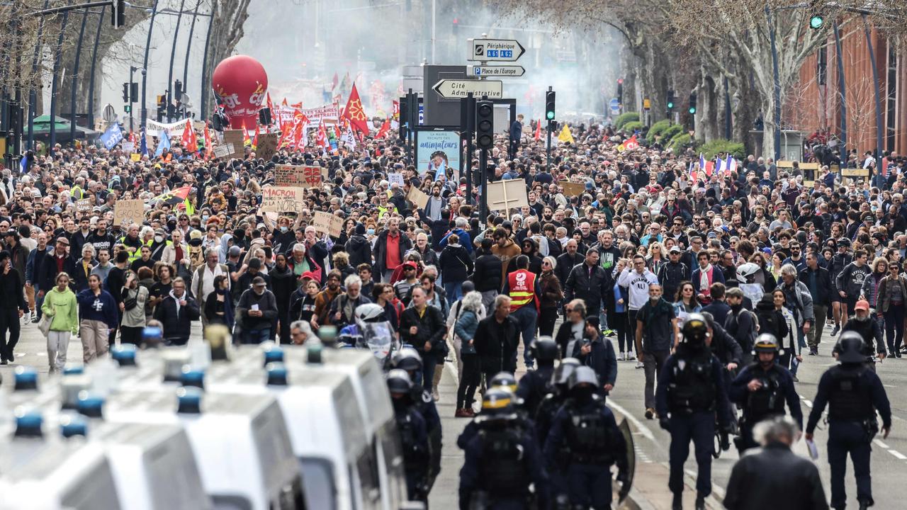 Shop and bank windows were smashed as protesters descended onto the streets of France. Picture: AFP