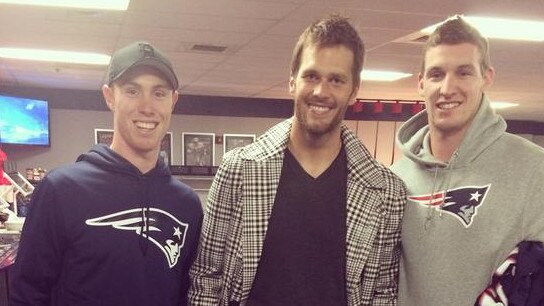 Adelaide’s Tom Lynch and Josh Jenkins with NFL superstar Tom Brady in 2014. Picture: Supplied