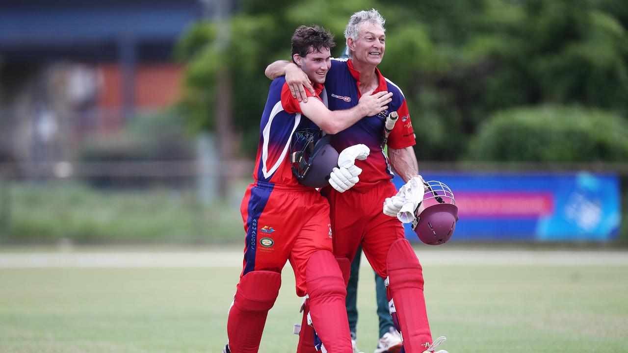 Mulgrave batsmen Matthew Wilkins and John Stampa congratulate each other on their winning partnership, claiming victory in the Cricket Far North Grand Final match between Rovers, held at Griffiths Park. Picture: Brendan Radke