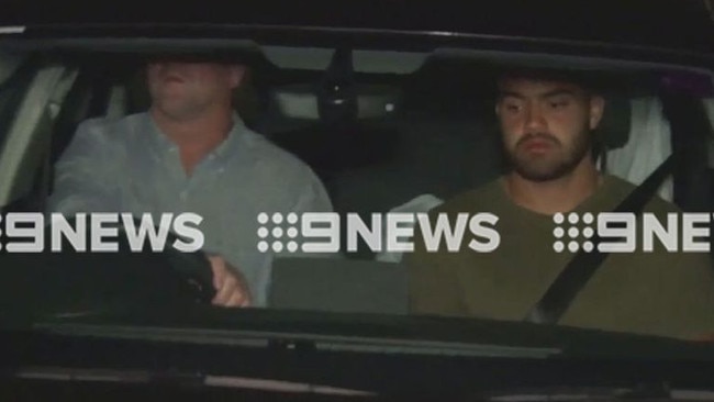 Manly's Dylan Walker being picked up by coach Des Hasler at Manly Police station after being charged over a domestic violence assault. Picture: 9 NEWS.