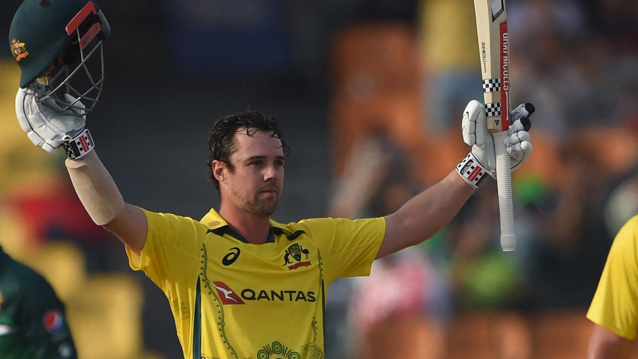 Australia's Travis Head (L) celebrates after scoring his second ODI century. Photo: AFP
