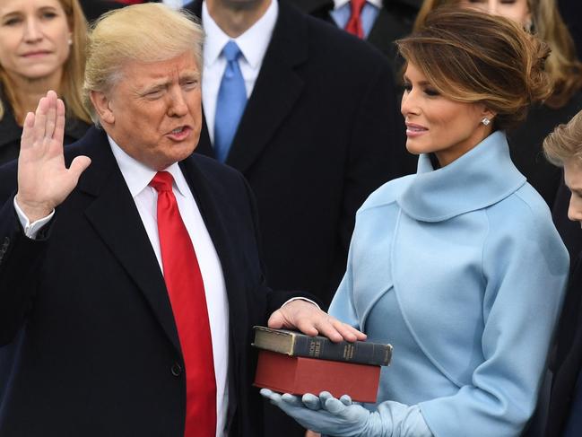 (FILES) US President-elect Donald Trump is sworn in as President on January 20, 2017 at the US Capitol in Washington, DC. Trump said on January 17, 2025 that his inauguration as US president on January 20 will be moved indoors due to expected freezing weather. Trump said he will deliver is inaugural address in the Rotunda of the US Capitol. (Photo by Mark RALSTON / AFP)