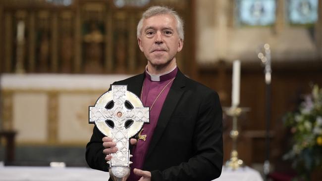 Archbishop of Wales Andrew John poses with the Cross of Wales. Picture: Getty Images