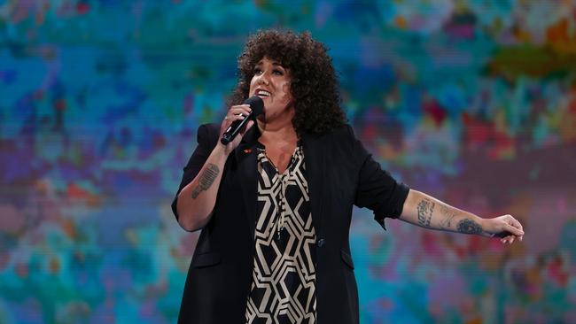 Casey Donovan performs on Rod Laver Arena ahead of the Semi Final singles matches. Picture: Cameron Spencer/Getty Images.