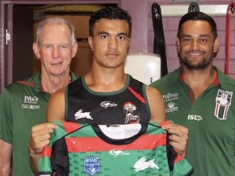 Joseph Suaalii with Wayne Bennett and John Sutton after signing with South Sydney