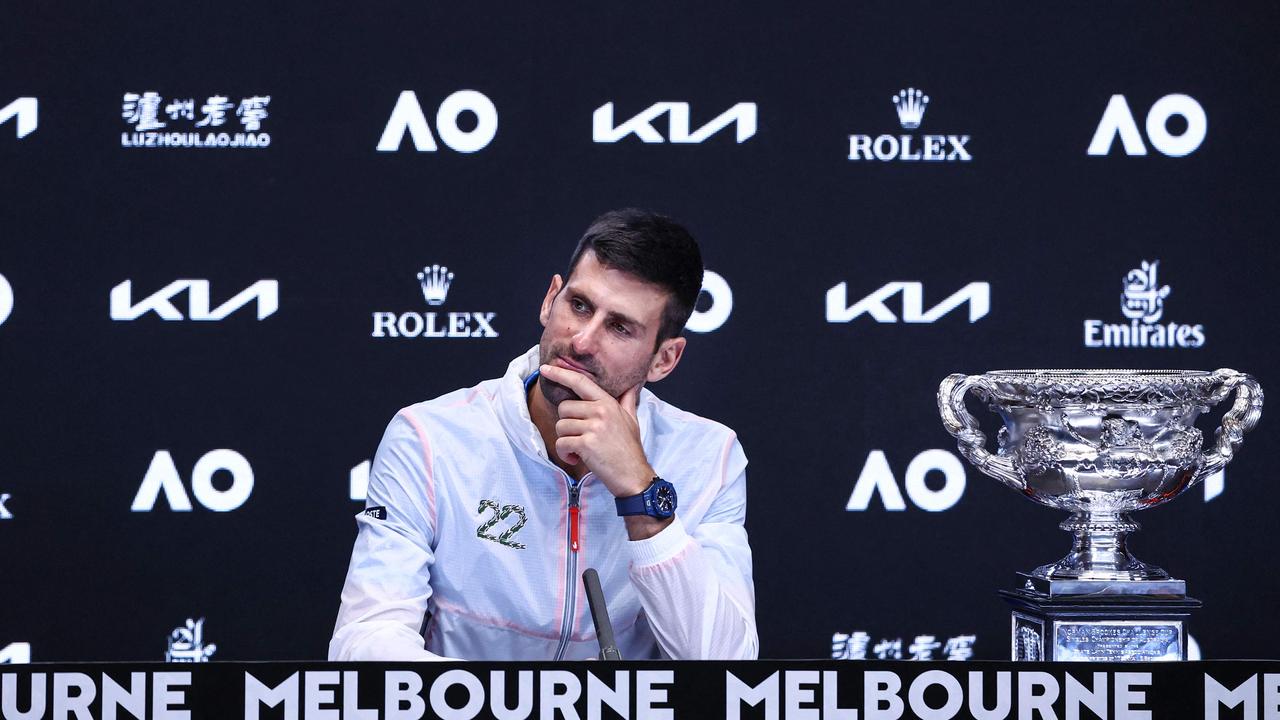 Novak Djokovic after winning his 10th Aussie Open. Photo by DAVID GRAY / AFP.