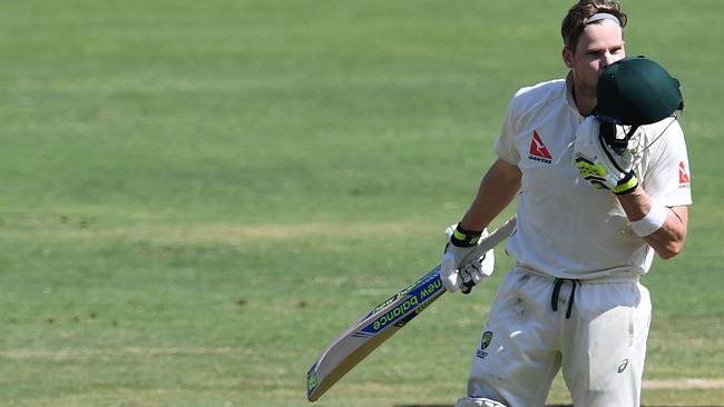 Australia captain Steve Smith celebrates his 18th Test century and arguably his most important as skipper.