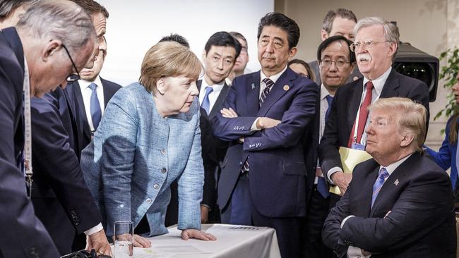 German Chancellor Angela Merkel faces off with US president Donald Trump on the sidelines of the G7 summit in 2018 in Charlevoix, Canada. Picture: Getty Images