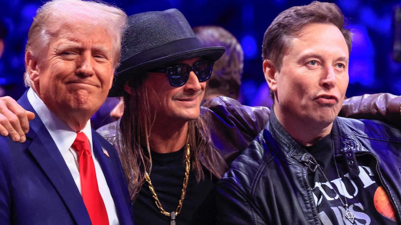 Here he is at the UFC with Mr Trump and singer Kid Rock. Picture: Kena Betancur/AFP