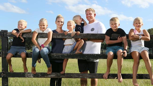 Ben Hannant with his family, minus their youngest baby. Picture Glenn Hampson