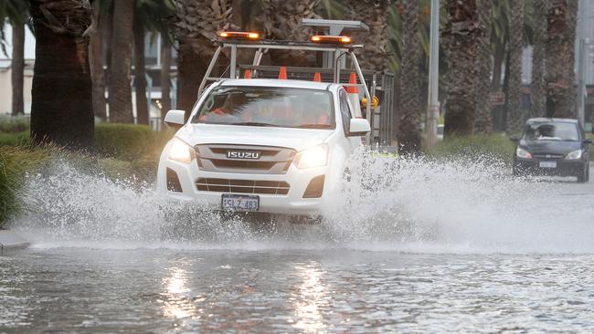 The strong front is the second in four days and is set to drench an already sodden Perth. Picture; Richard Wainwright/AAP