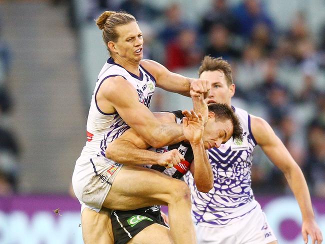 Nat Fyfe’s heavy clash with Levi Greenwood. Pic: Getty Images