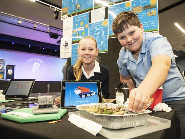 St Patrick's Allora students Katelyn Peters and Toby Schmidt with a project showing how to stop pollution around Allora as part of Kids in Space Queensland finals and showcase at Edmund Rice Cultural Centre St Mary's College, Friday, June 7, 2024. Picture: Kevin Farmer