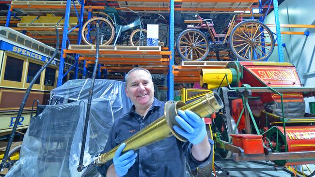 Neville Quick and some of the objects in storage at the Moreland Annexe. Picture: Craig Hughes