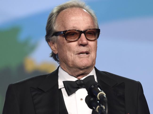 FILE - In this Jan. 2, 2018 file photo, Peter Fonda presents the Desert Palm achievement award at the 29th annual Palm Springs International Film Festival in Palm Springs, Calif. Fonda has apologized for a late-night Twitter rant that said 12-year-old Barron Trump should be ripped from â€œhis motherâ€™s arms and put in a cage with pedophiles.â€ The all-capitals tweet early Wednesday went on to call President Donald Trump an expletive. Fonda later deleted the tweet and drew sharp rebukes from first lady Melania Trump and Donald Trump Jr. (Photo by Chris Pizzello/Invision/AP, File)